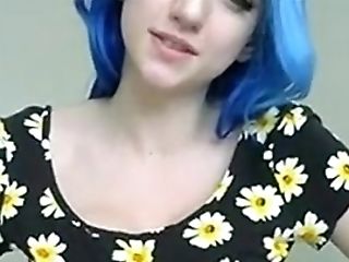 Blue Haired Gal In Flowers Plays With Tits